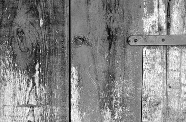 Grungy wooden planks background in black and white.
