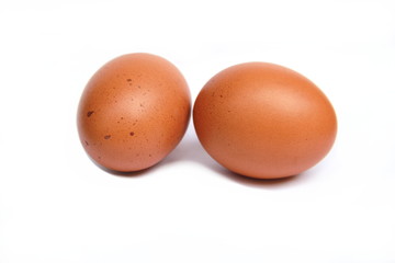 A group of brown eggs isolated on white background.
