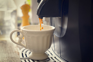 Coffee machine making coffee