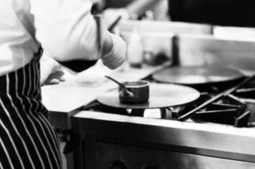 Chef cooking food in the kitchen, Chef preparing food
