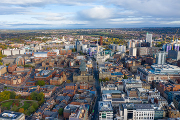 Fototapeta na wymiar Aerial photo of the Leeds town centre in the UK showing the Leeds Town Hall with construction work being done on the tower