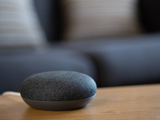 smart home voice activated speaker device in living room lounge