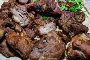 delicious kebabs in a plate. Close-up. Large pieces of meat.