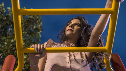 Beautiful woman in the playground