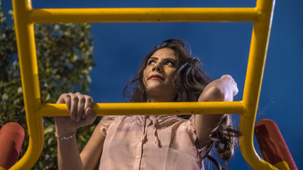 Obraz premium Beautiful woman in the playground