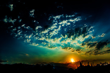 night sky with clouds and sun