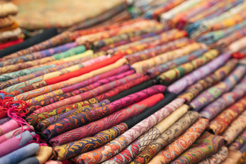 Traditional Indian fabric store. Colorful traditional indian textile fabric wrap scarfs