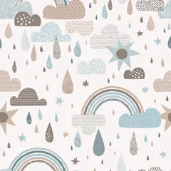  Vectorhemel naadloos patroon met wolken, regendalingen, regenboog, zon. Leuke doodle decoratieve Scandinavische print voor textiel, stof, kleding genderneutraal kinderkamerontwerp © AngellozOlga