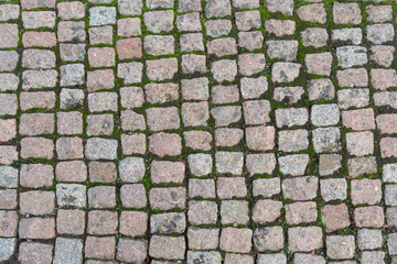 Old road paved with the cobble stones texture walpaper
