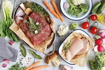 Healthy food. Selection of meat, vegetables and herbs for cooking of healthy dinner. Overhead view
