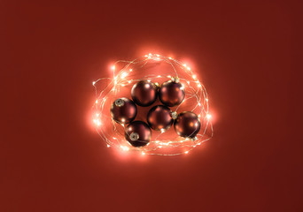 Christmas lights and Christmas red balls. Xmas ornaments