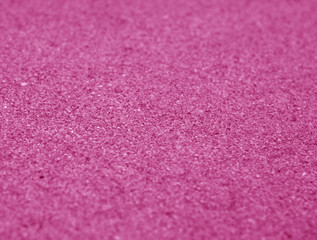 Natural cork texture with blur effect in pink color.