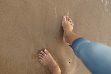 feet on the beach
