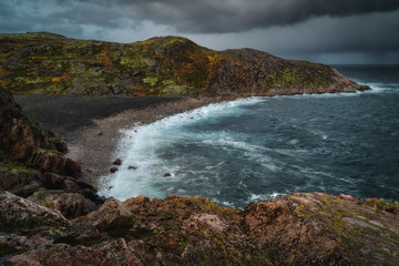 Obraz premium Stormy waves at Barents Sea, Arctic Ocean. Kola Peninsula, Murmansk region in Russia