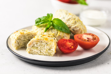 Healthy cabbage rolls with vegetables and sour cream sauce. Selective focus, space for text.