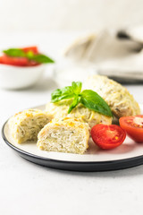 Healthy cabbage rolls with vegetables and sour cream sauce. Selective focus, space for text.