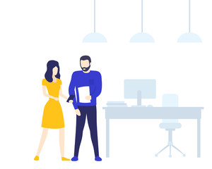 two colleagues speaking in office