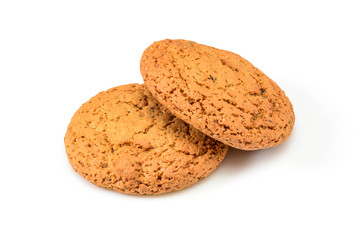 Homemade cookies. Two sweet cookie made from oatmeal flour. Tasty biscuit close-up isolated on white background. Homemade bakery.
