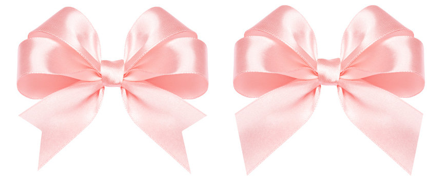 Gift Bow Made Of Pink Silk Ribbon Isolated On White Background