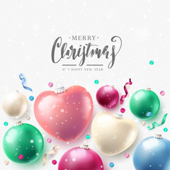 Fototapeta na wymiar Christmas greeting card with glass baubles and streamers
