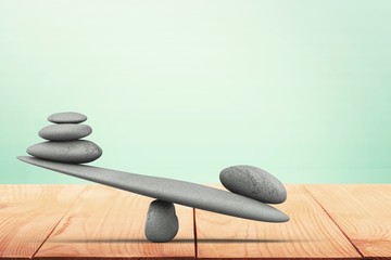 Zen stack basalt sea stones on desk