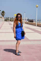 young woman walking on the street