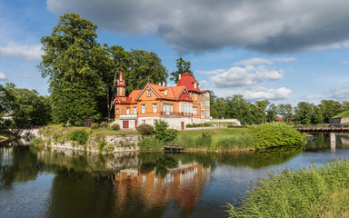 Fototapeta na wymiar Wooden Houses in front of the Kuressaare Castle on the island Saaremaa; Estonia