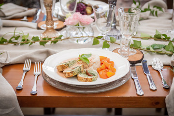 Hot dish. Rustic decoration from natural things for a perfect wedding reception. Boho party. Elegant catering.