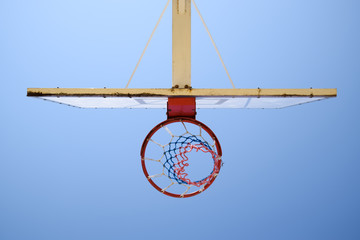 Basketball hoop, blue sky