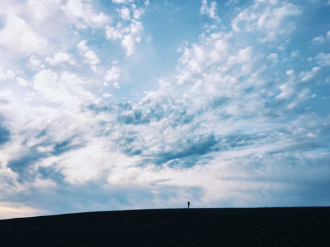 Silhouette of man against sky