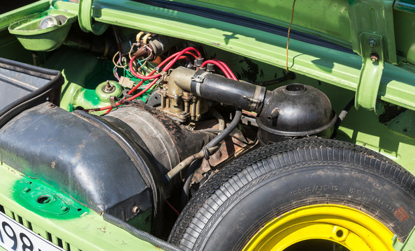 Under the hood of a retro soviet vehicle, engine of old car ZAZ-968M Zaporozhets