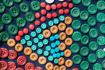 Fototapeta premium Background many buttons on the fabric.