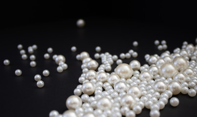Bunch of multi size pearls on a background.Glamorous pearls milky-way.luxury lifestyle.Holiday...
