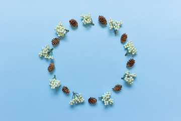 Christmas wreath on blue backgound