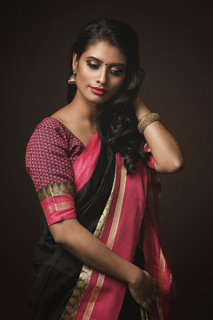 Beautiful Indian woman wearing traditional sari dress