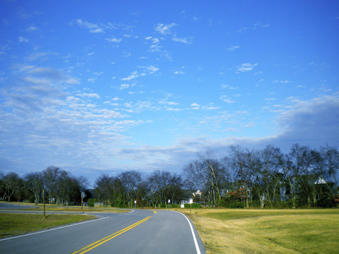 Bright Blue Sky Above A Wide Open Road