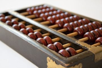 Old abacus for subtraction, division and multiplication.education mental math.count, add, subtract,...