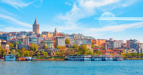 Obraz premium Galata Tower, Galata Bridge, Karakoy district and Golden Horn at amazing sunset sky - Istanbul, Turkey 