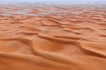 Fototapeta na wymiar Sand Dune in the Sahara / In the Sahara Desert, sand dunes to the horizon, Morocco, Africa.