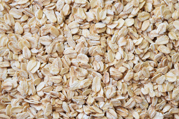 Traditional raw oats background. Top view texture