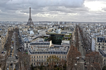 Paris, France - January 13th 2019 : view of Paris from the triumphal arch. You can see two avenues and the Eiffel tower.