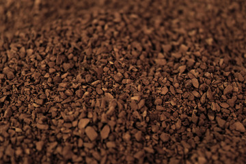 Coffee beans texture. Coffee grains. Unfocused background