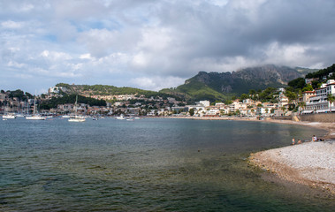 Port Soller Majorca a scenic view across the bay and beach towards the mountains.