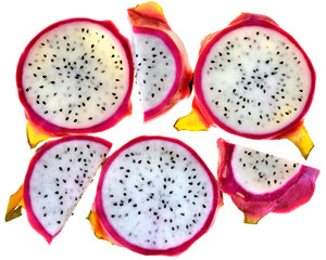 Fototapeta premium Sliced ​​dragon fruit close-up top view isolated