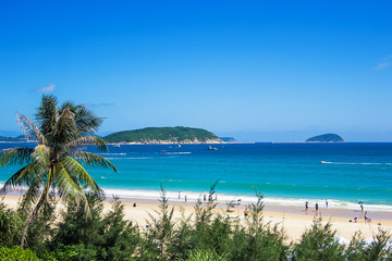 Exotic beach in Sanya on the tropical island of Hainan, South China sea, Asia
