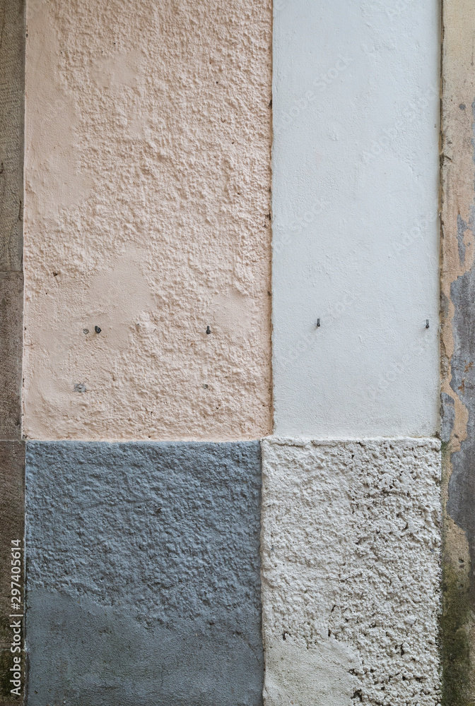 Aufkleber front view of a plastered wall painted in different colors. high resolution full frame textured back
