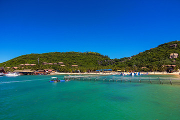 Beach on the small Boundary island near Sanya, exotic Hainan island, China, South China sea. Beautiful chinese beach with azure water, good ecology