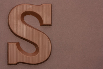 Chocolate letter S. Symbol of Dutch feast called Sinterklaas.