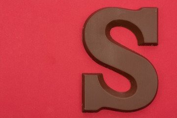 Chocolate letter S. Symbol of Dutch feast called Sinterklaas.