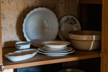 Wooden, copper, metal old vintage pots, jars, pan, wheel in retro style. Vintage kitchenware